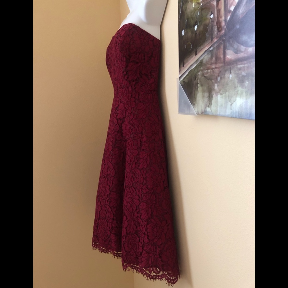 Red lace strapless dress.